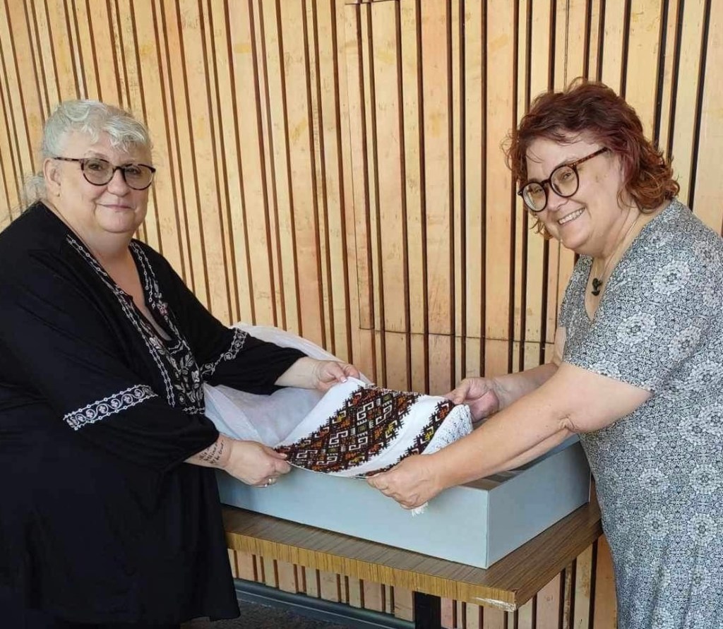 Patricia Robin Woodruff Examining Hutsul textiles with Tamara Ivanochko, Administrator of the Ukrainian Museum of Ontario, Canada.
